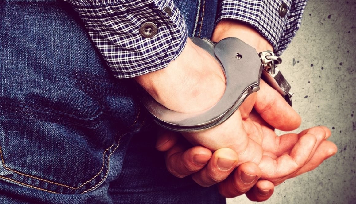 Arrested Man in Handcuffs